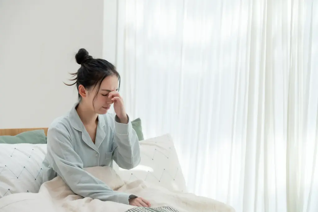 目覚めが悪い女性